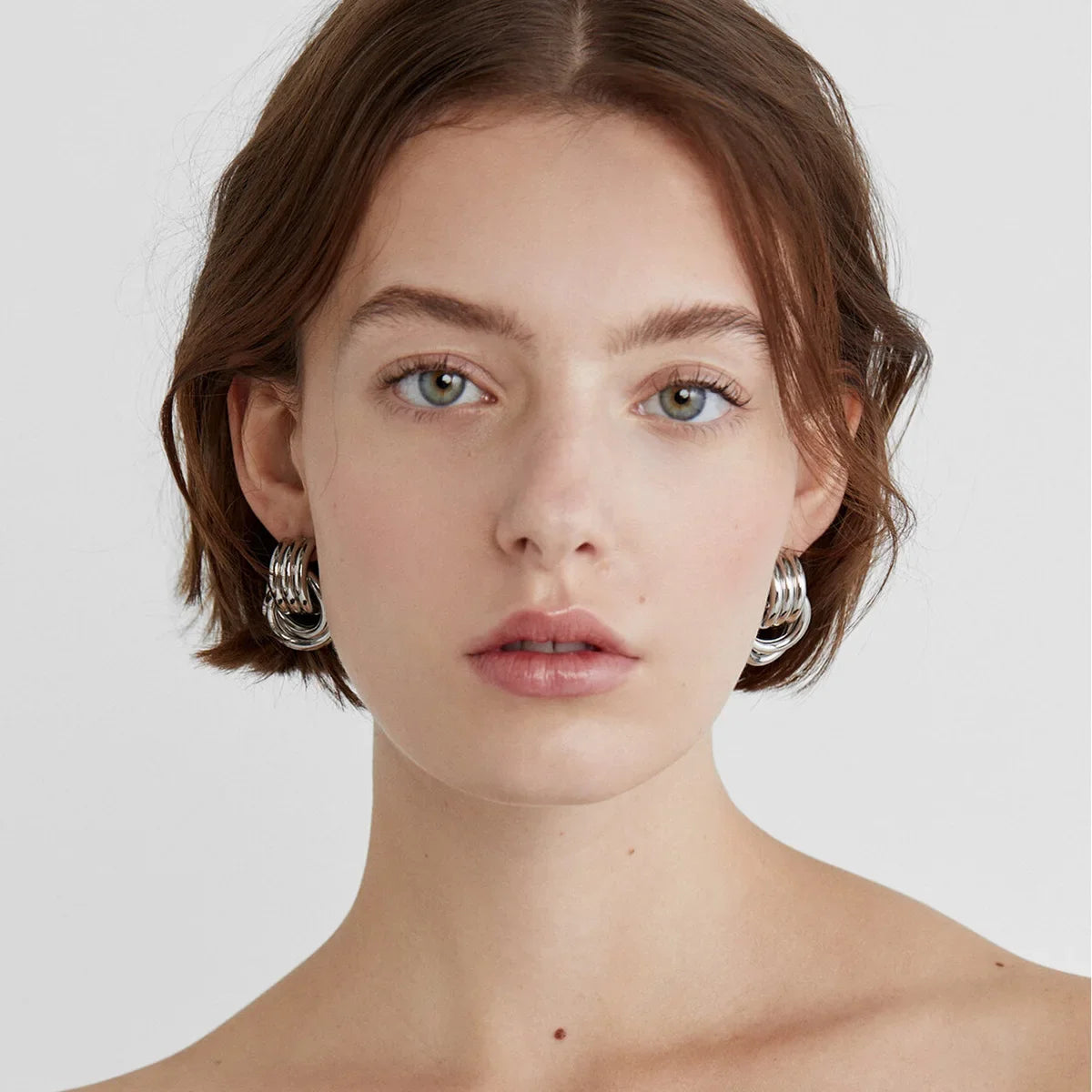 Pendientes de nudo torcido circulares multicapa de acero inoxidable a la moda para mujer, pendientes llamativos chapados en oro con textura de colores mezclados, bisutería